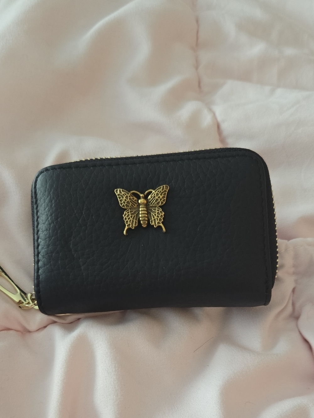 Source Unknown Black Wallet with Gold Butterfly Emblem